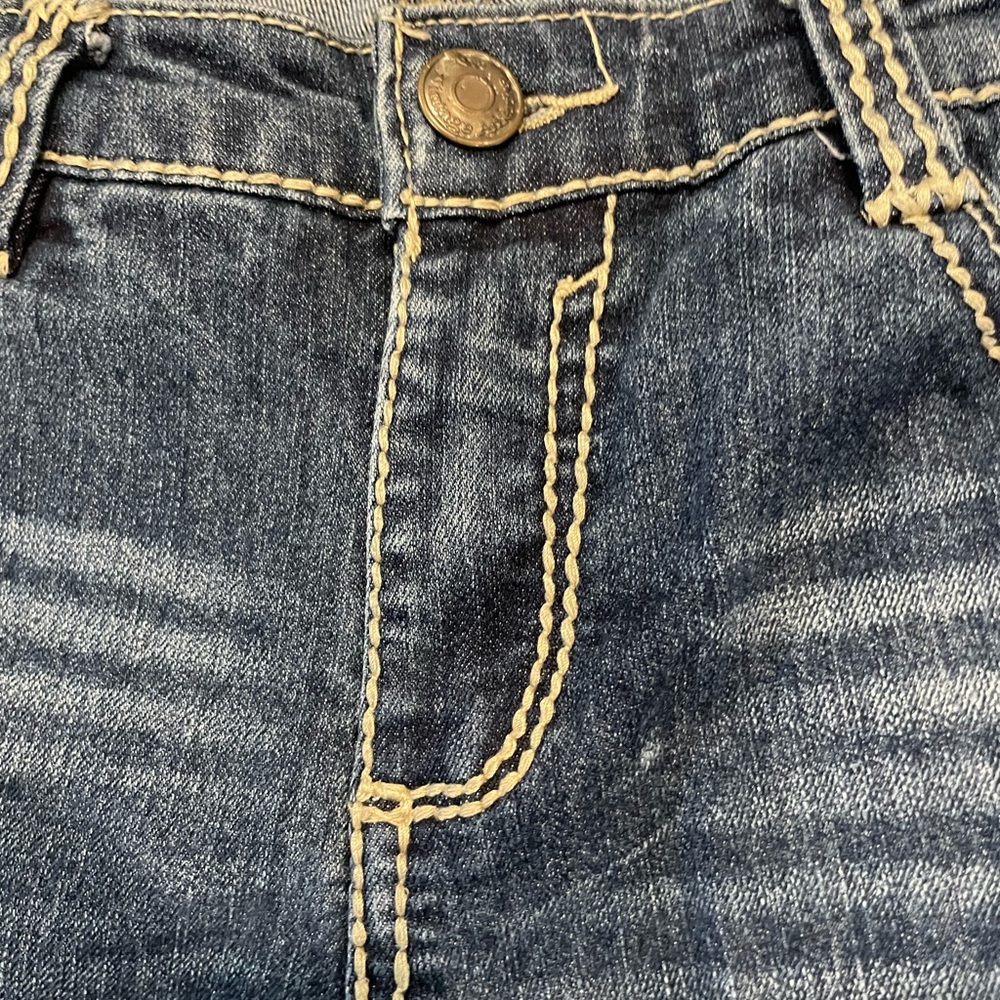Nine West Vintage, size 10 boot cut jeans with double cream stitching.